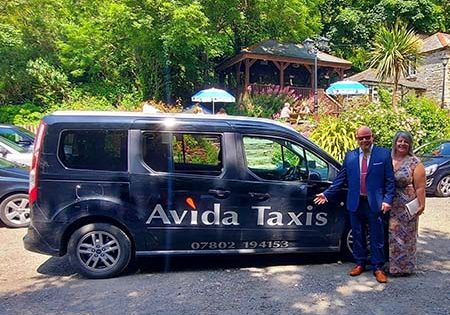 Avida taxi at wedding with its passengers
