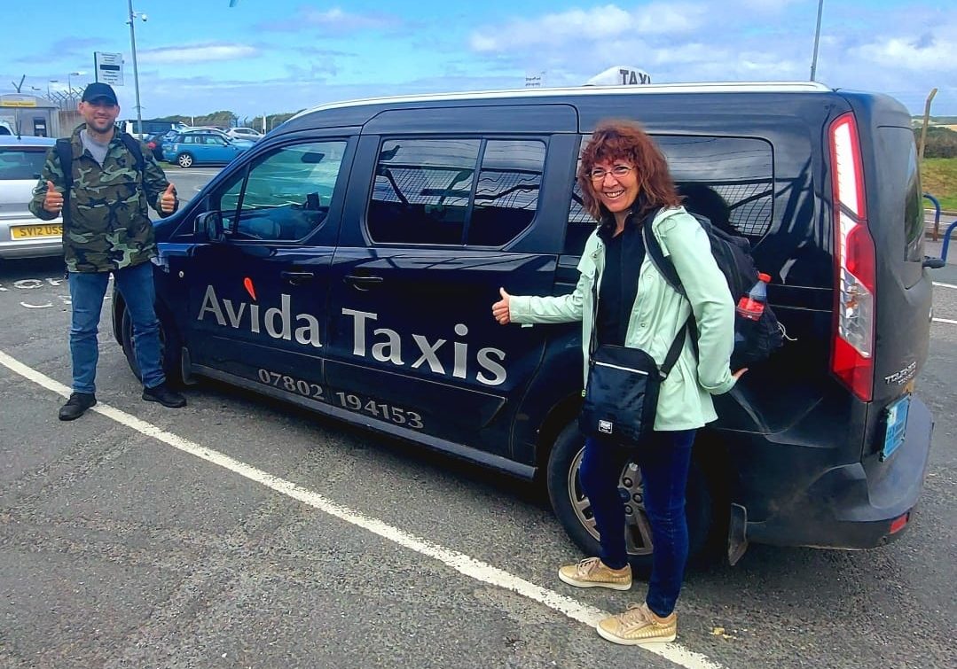 Avida taxis picking people up from the airport